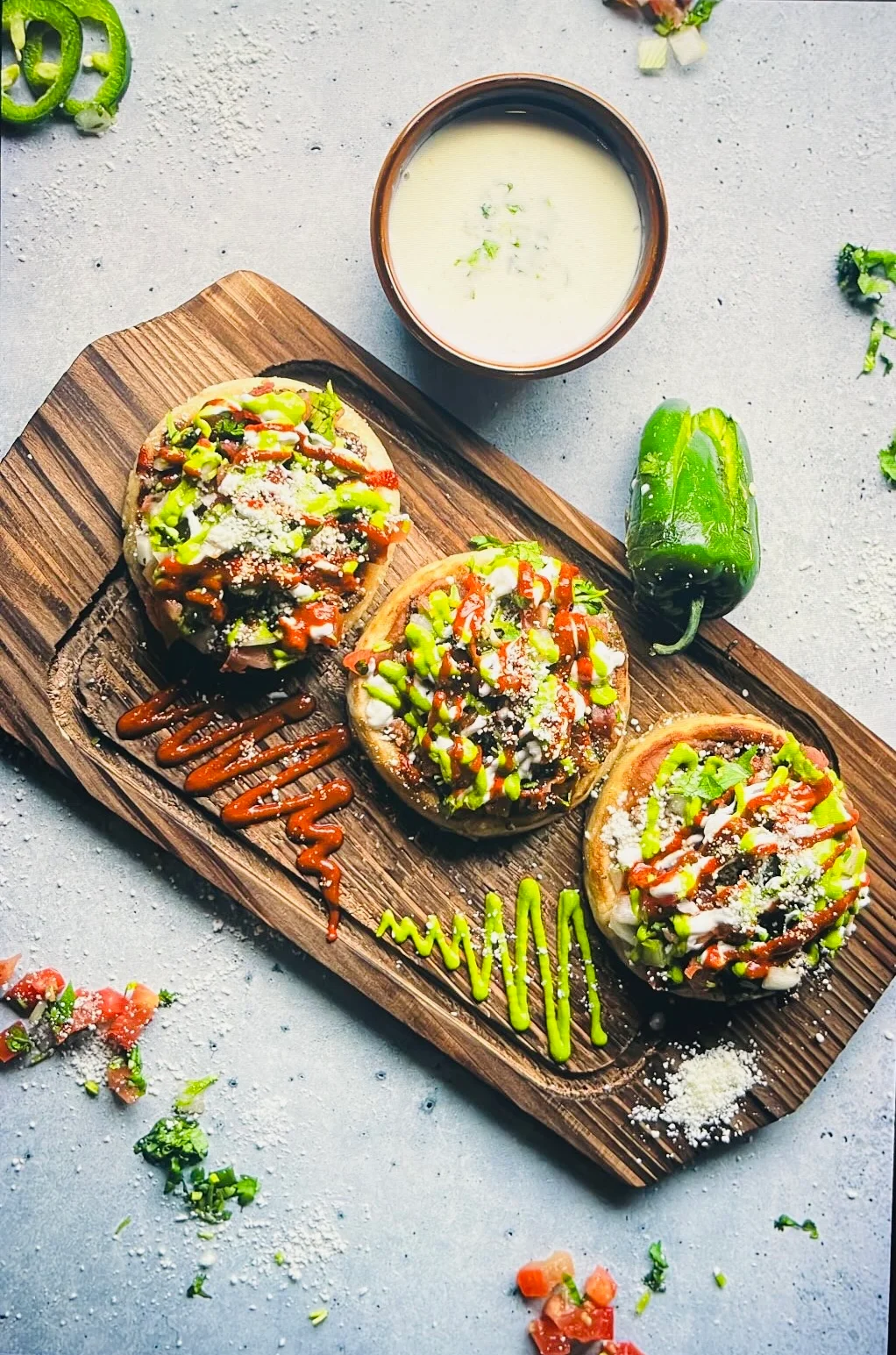 Delicious Mexican sopes topped with fresh ingredients and sauces