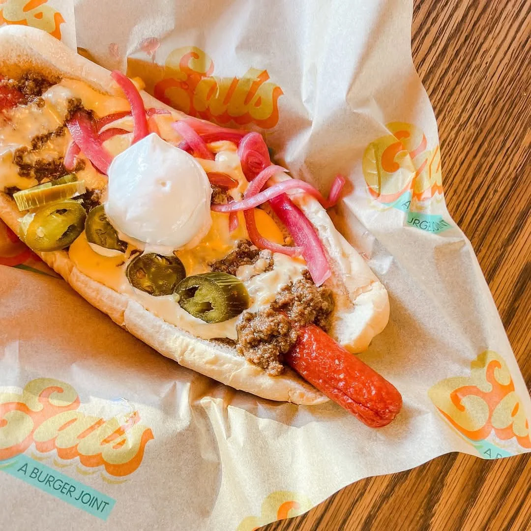 Loaded chili cheese dog with toppings