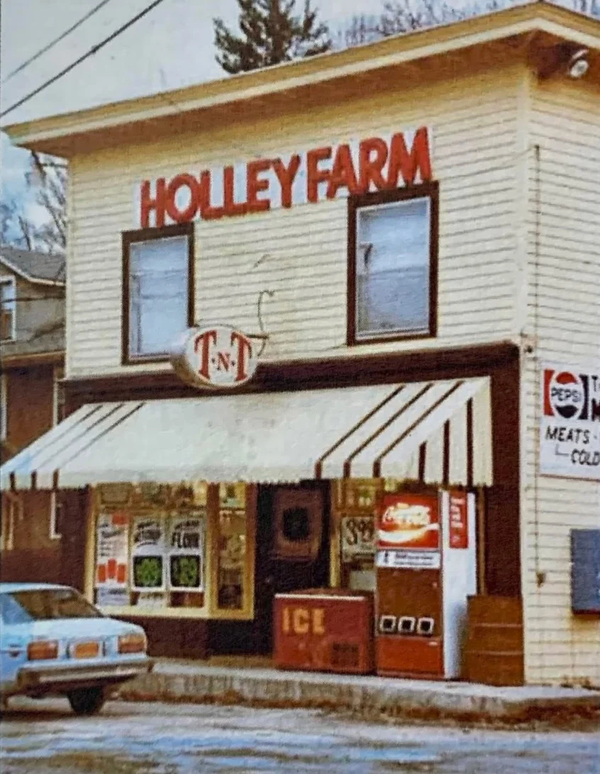 Historic storefront of Holley Farm market with vintage signage