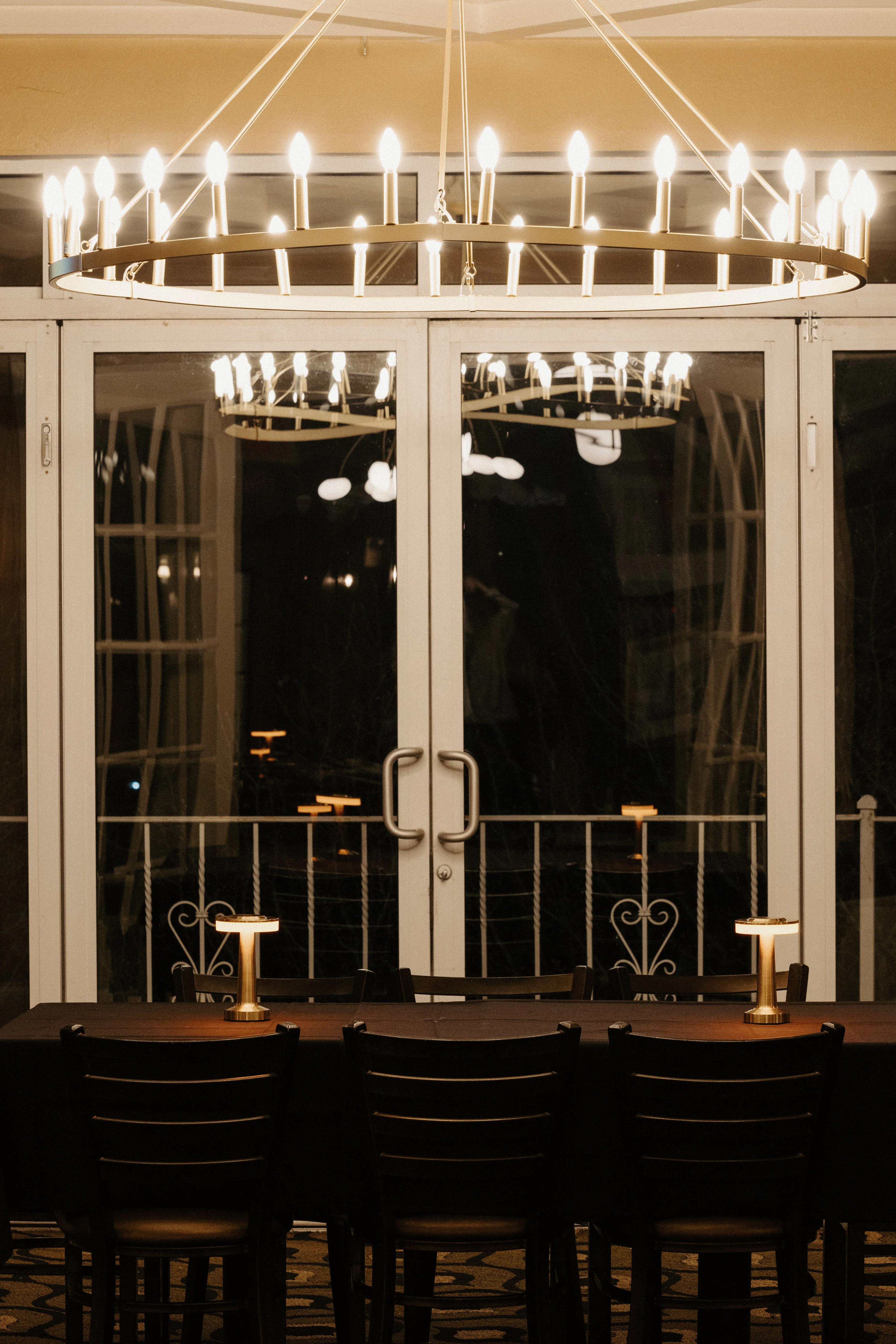 Elegant restaurant interior with chandelier and cozy lighting
