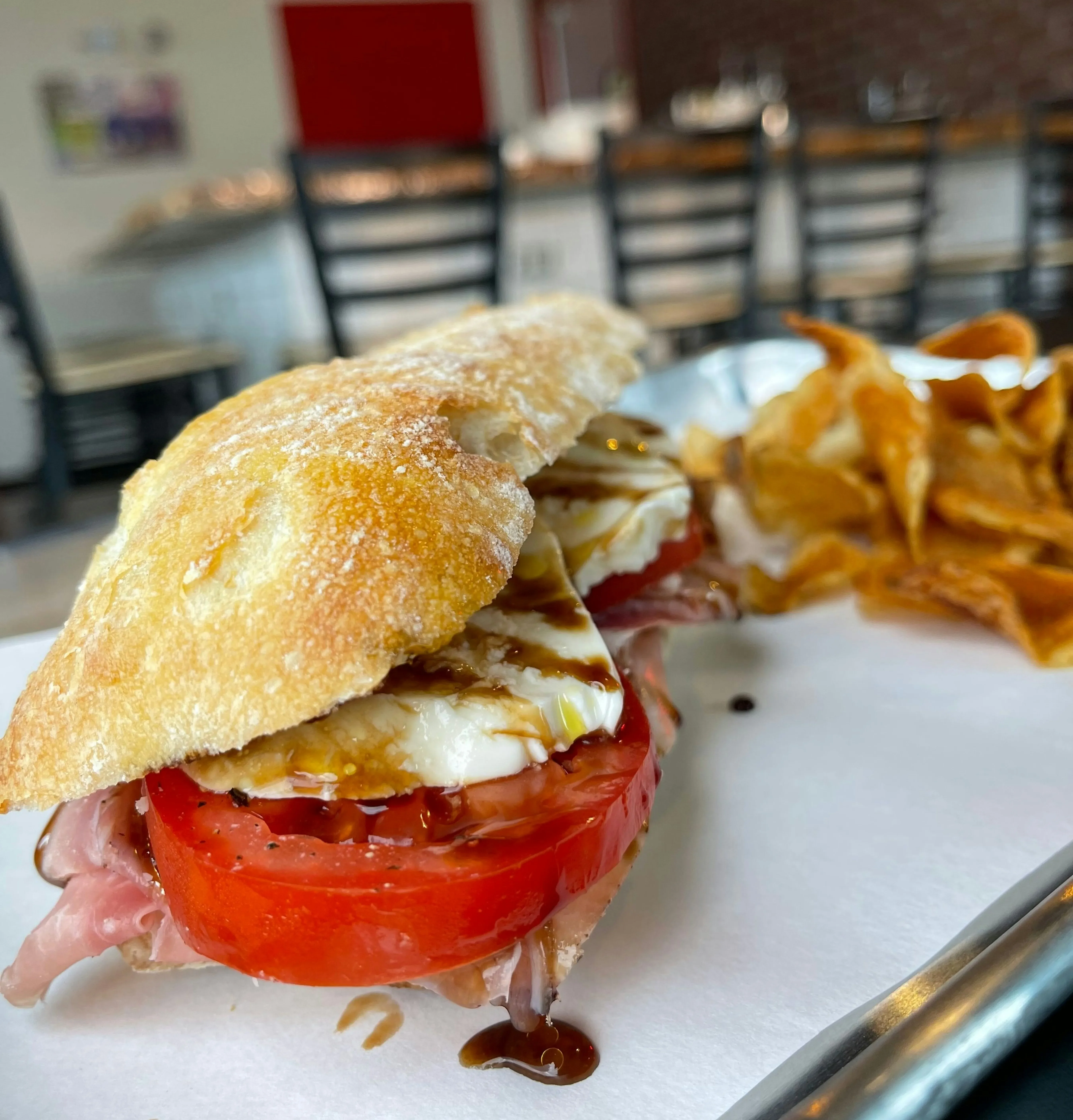 Italian ciabatta sandwich with ham and tomato