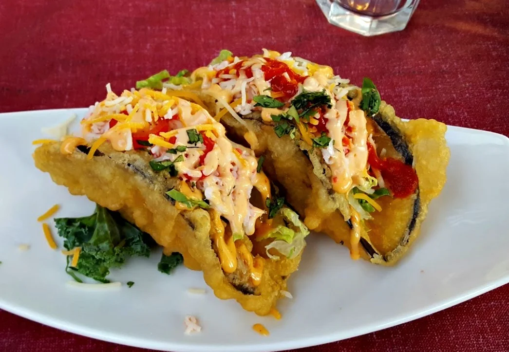 Crispy Mexican tacos dorados with toppings