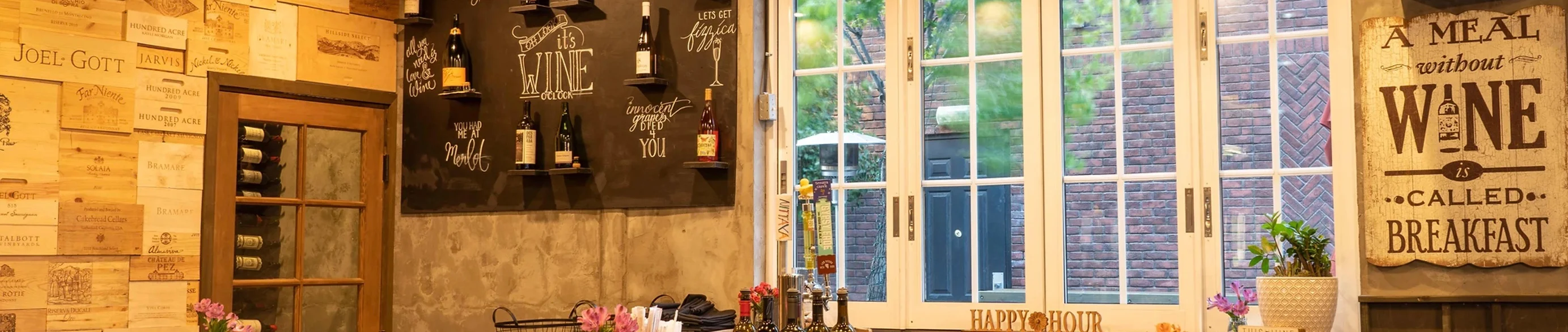Cozy restaurant interior with wine decor and natural light