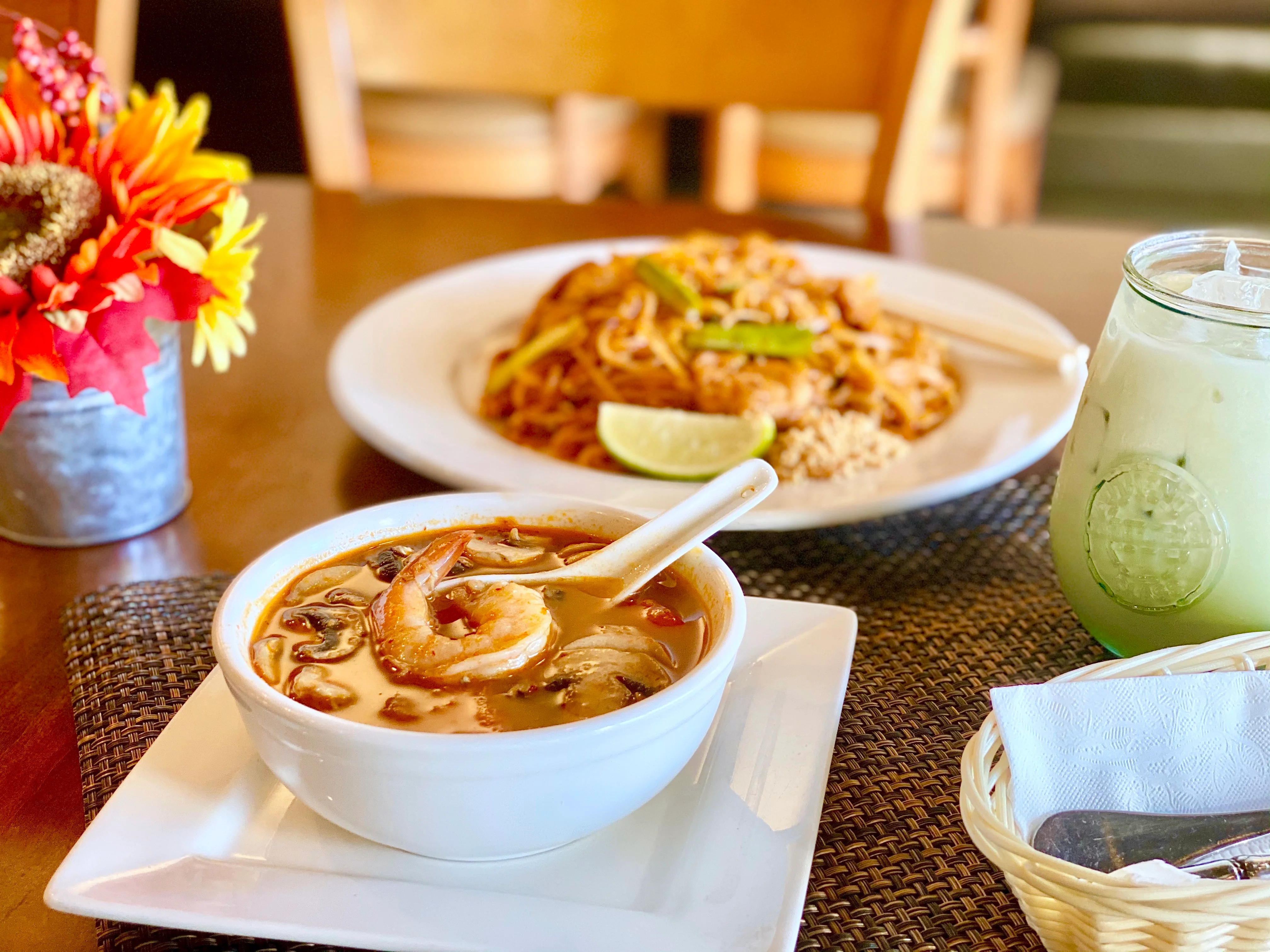 Thai tom yum soup with shrimp and herbs