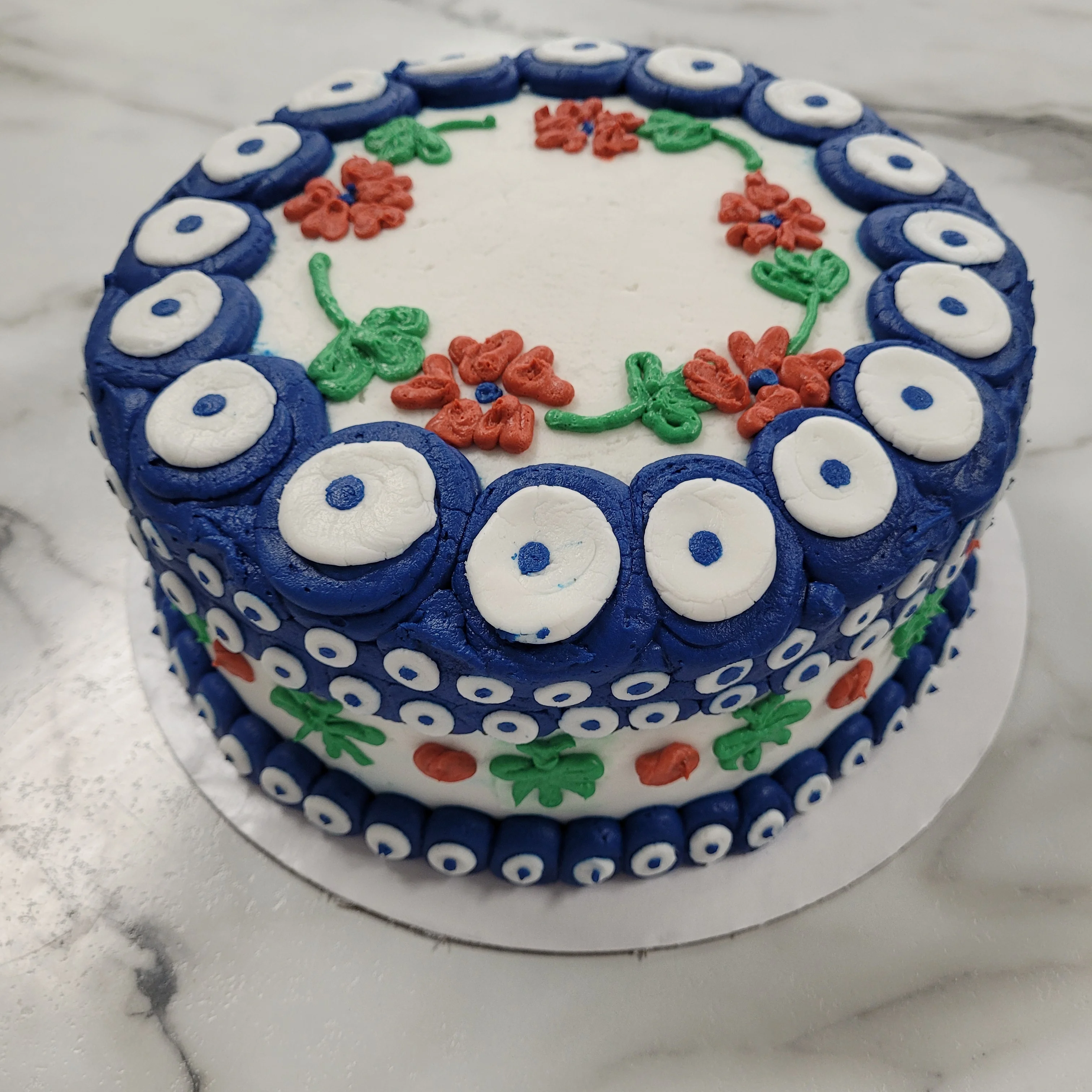 Decorative Turkish evil eye cake with floral designs