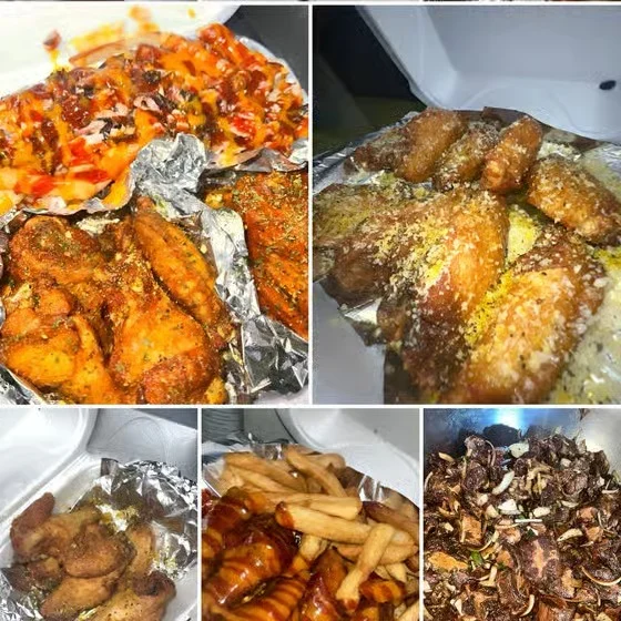 Variety of delicious takeout food including wings, fries, and appetizers.