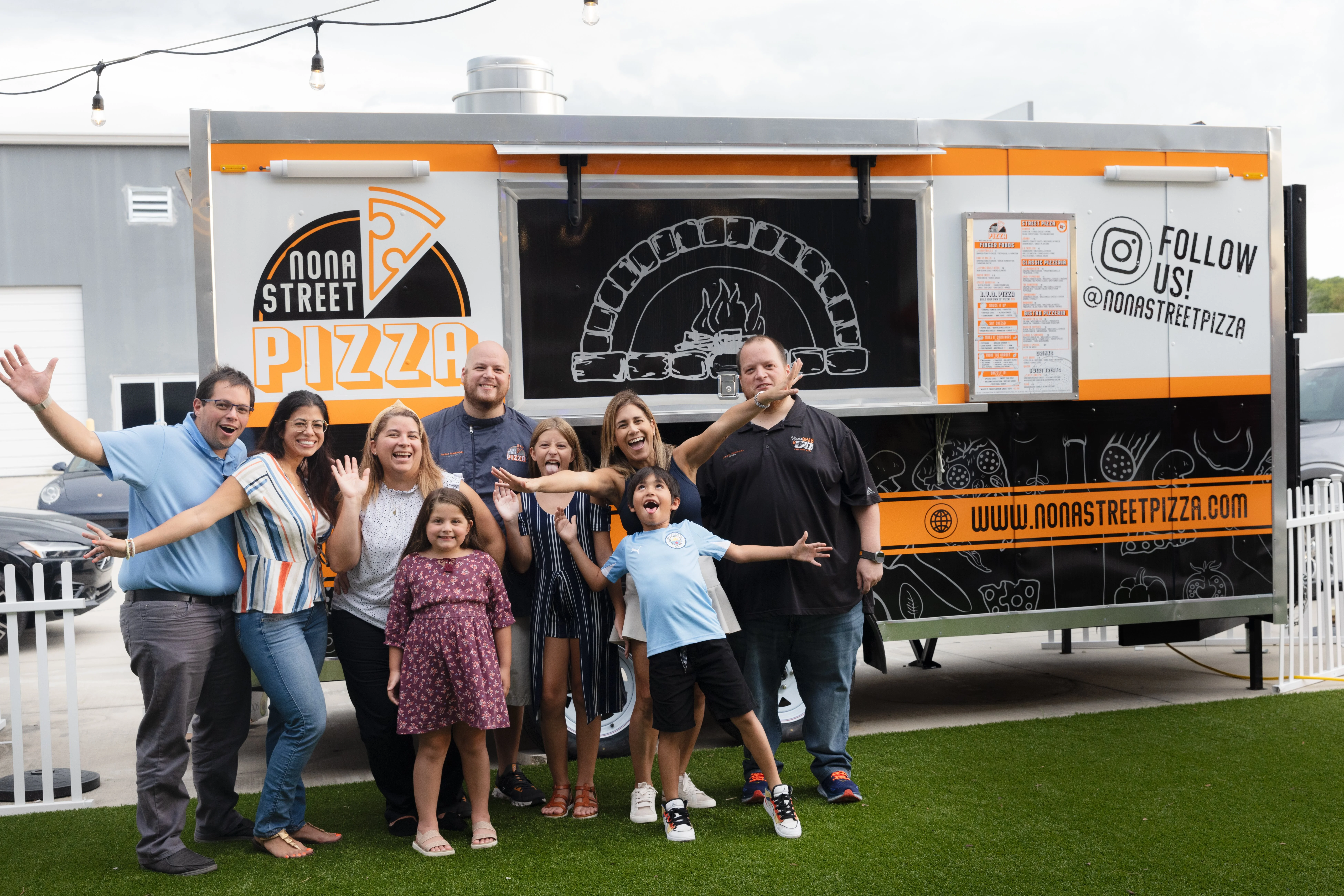 Nona Street Pizza team with the family.