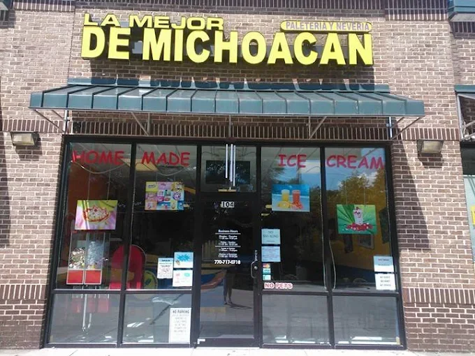 Colorful ice cream shop front with homemade treats