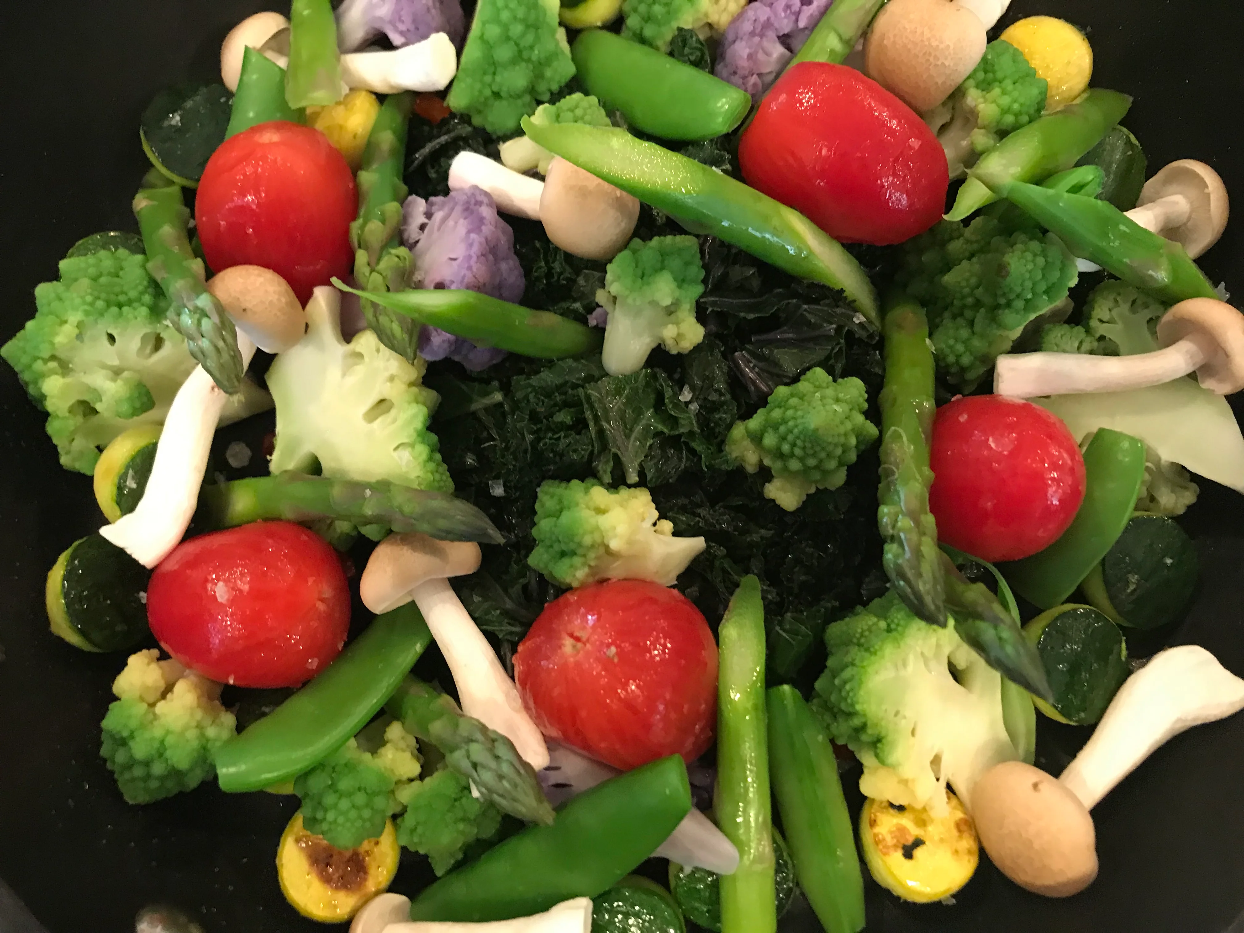 Colorful vegetable stir-fry in a wok
