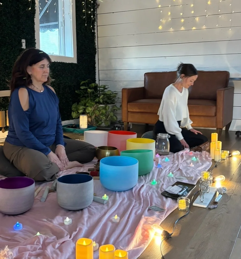 Sound healing session with singing bowls and candles