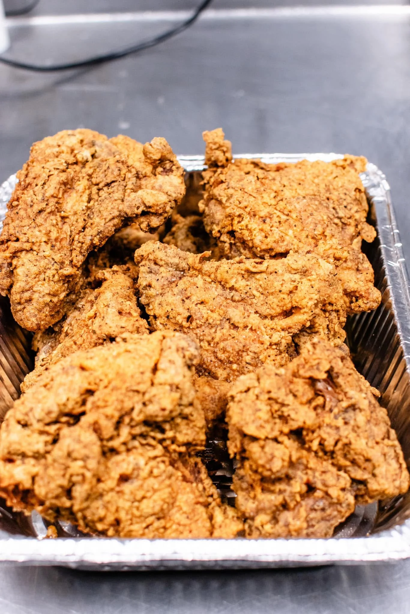 Crispy Southern fried chicken in a serving tray