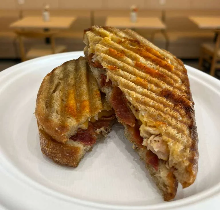 Grilled panini sandwich with savory fillings