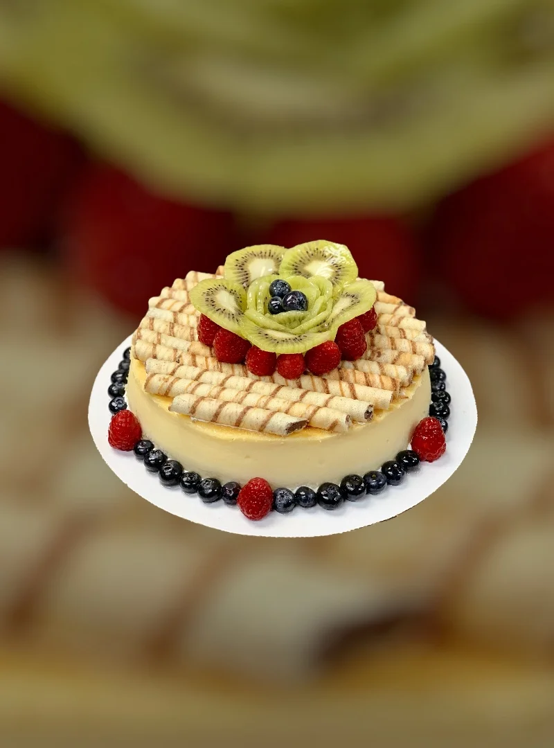 Colorful fruit tart with kiwi and berries