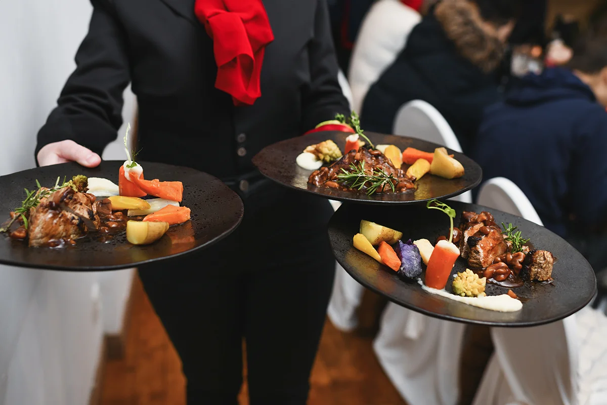 Elegant plates of gourmet beef dishes served at a fine dining restaurant