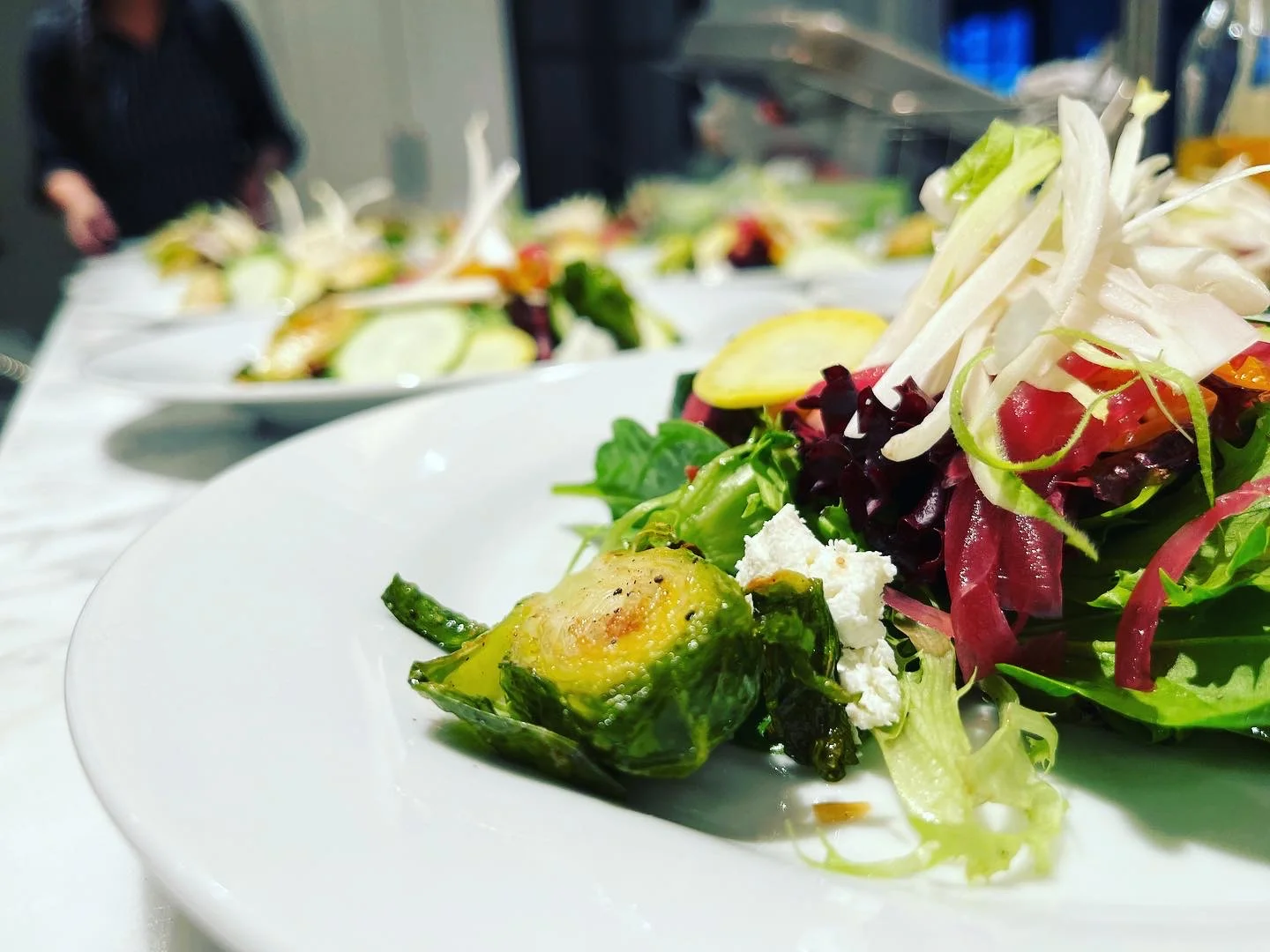 Fresh garden salad with roasted Brussels sprouts