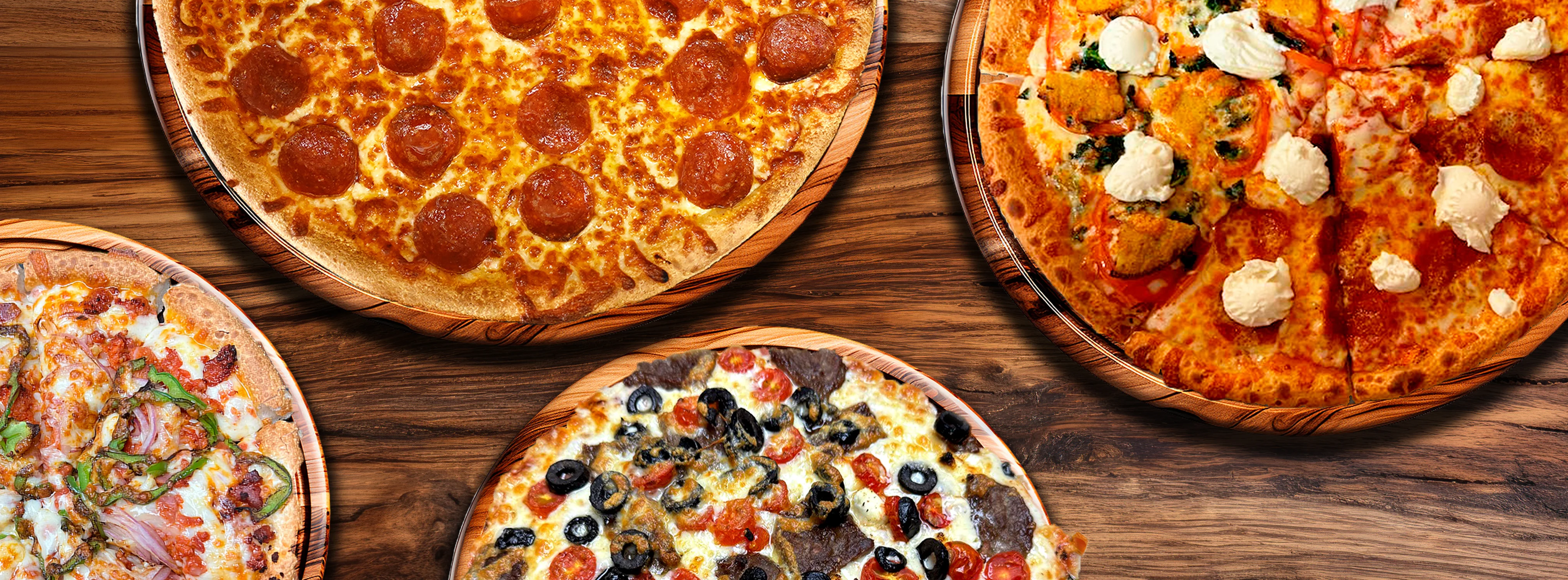 Assorted pizzas including pepperoni and gourmet toppings