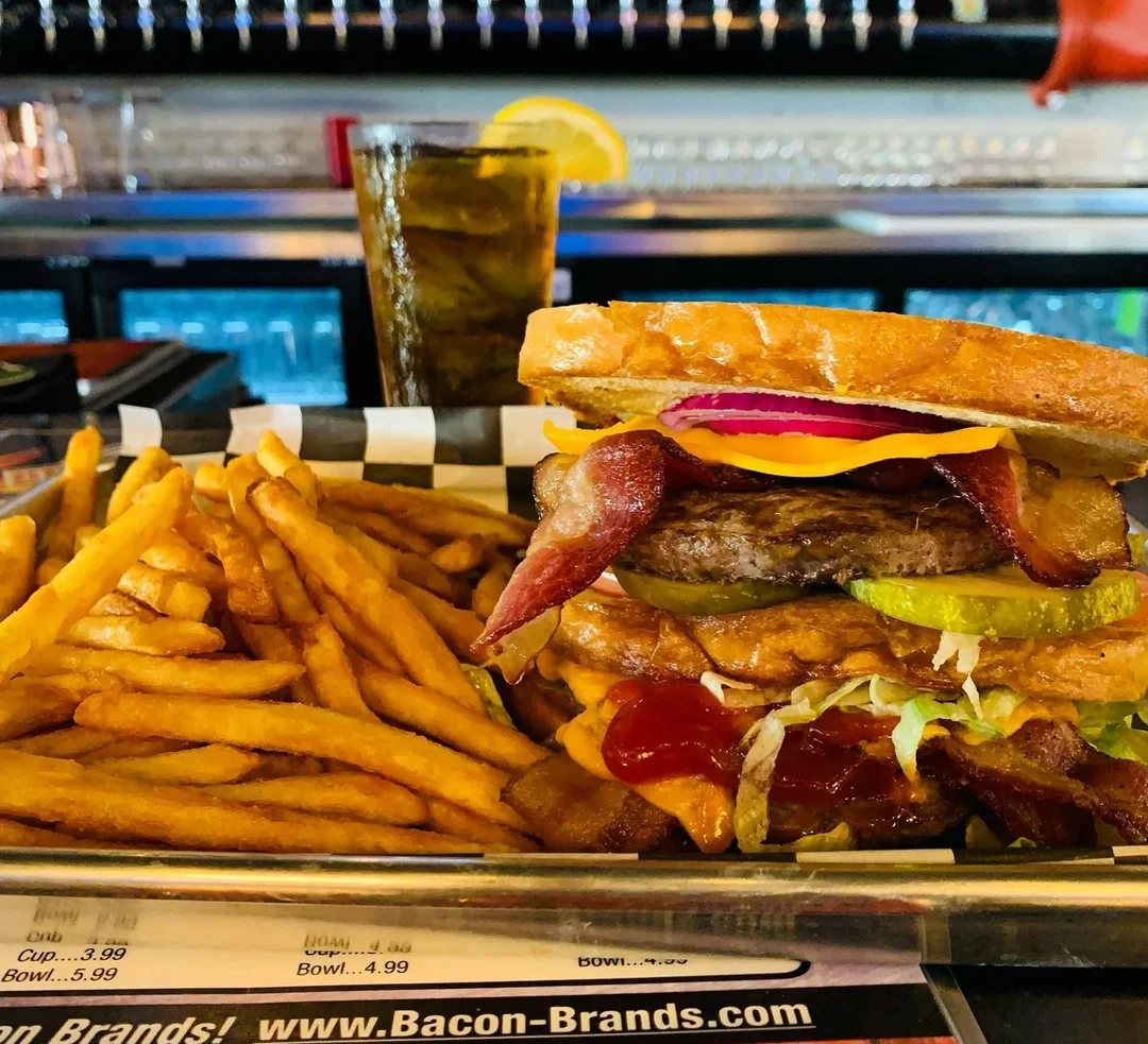 Classic American cheeseburger with fries