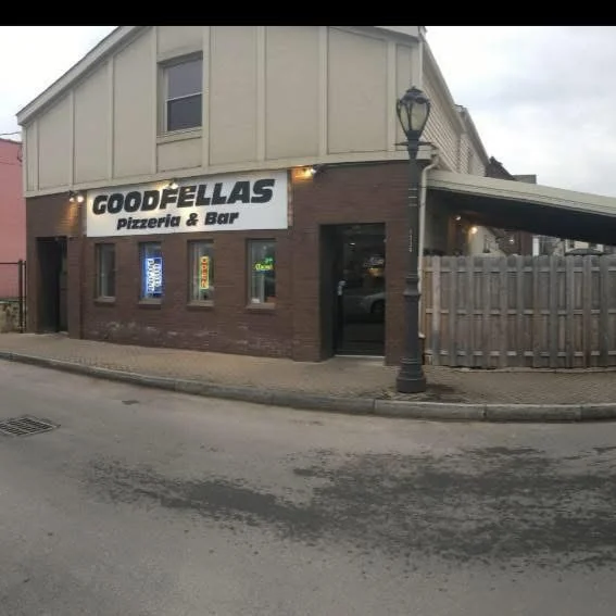 Exterior view of Goodfellas Pizzeria & Bar with inviting signage