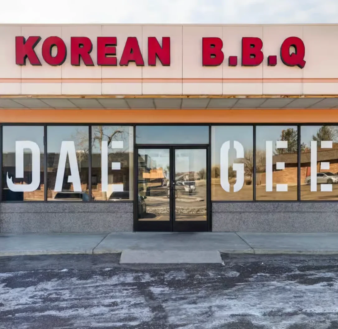 Exterior view of Dae Gee Korean BBQ restaurant with red accents