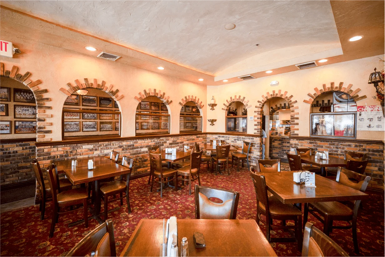 Cozy restaurant interior with rustic decor and warm lighting