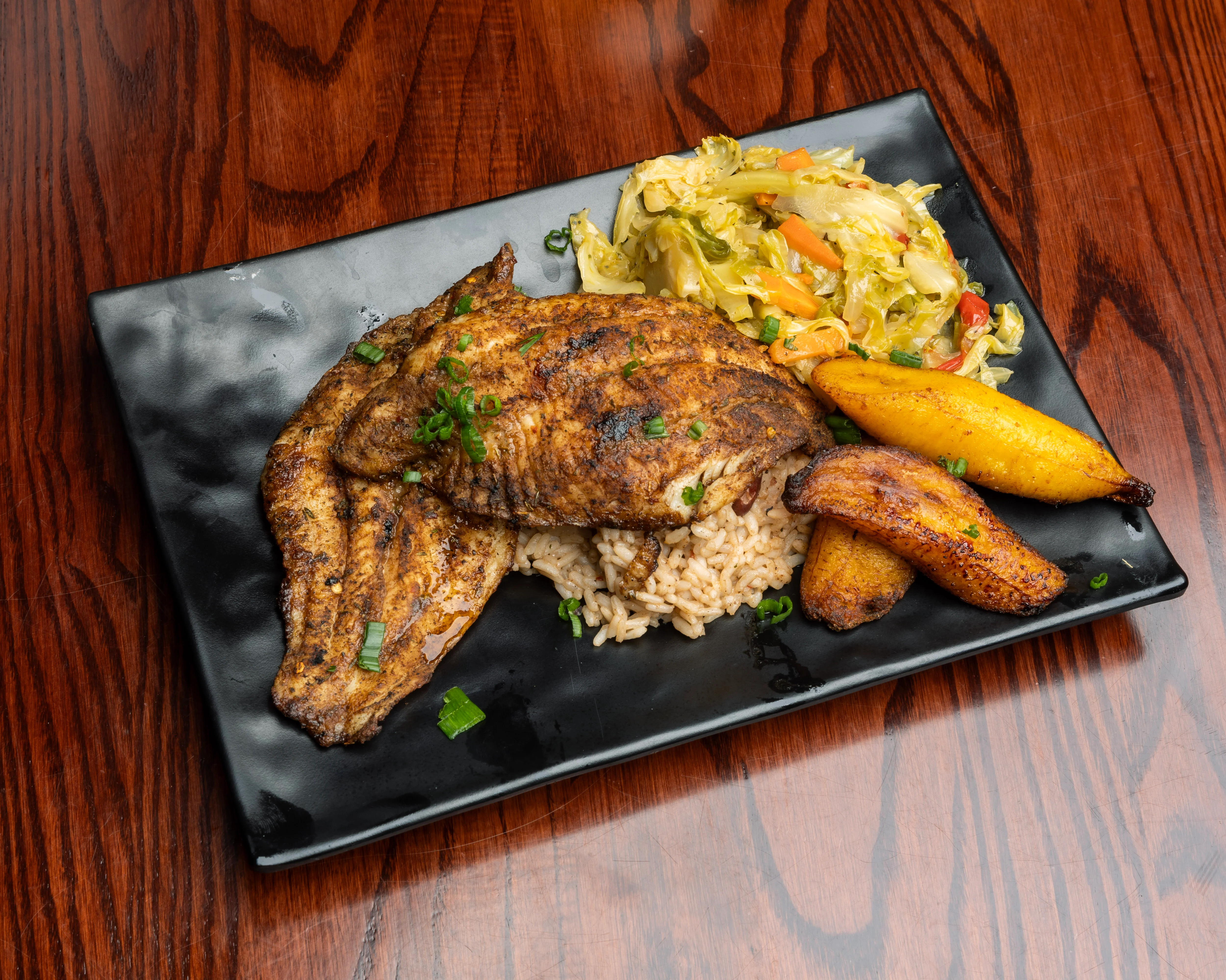 Jamaican escovitch fish with rice and peas