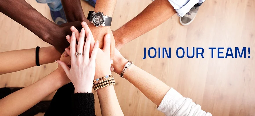 Diverse hands joining together in teamwork