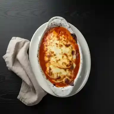 Baked Italian lasagna with rich tomato sauce and melted cheese