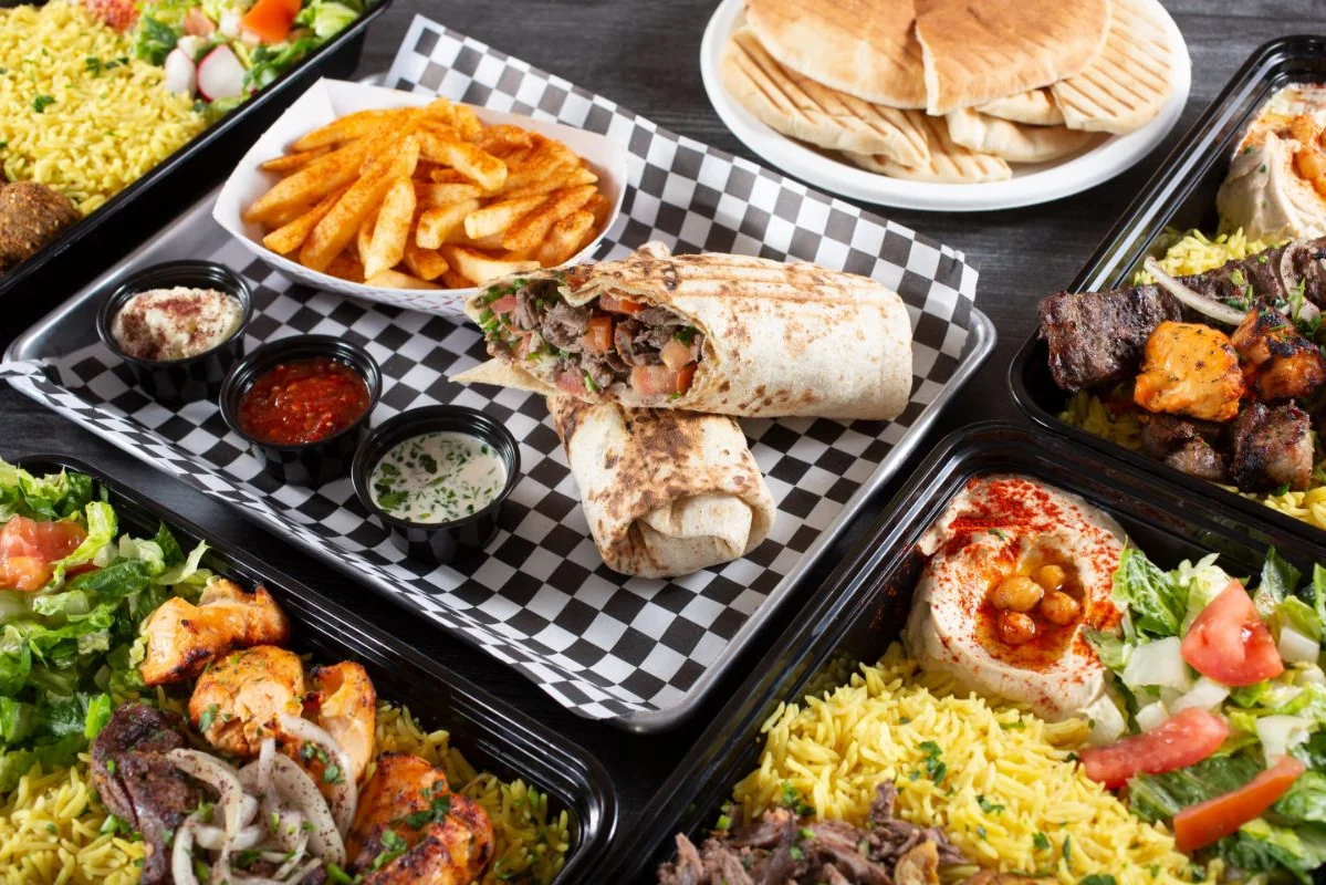 Mediterranean platter with shawarma wraps and seasoned fries