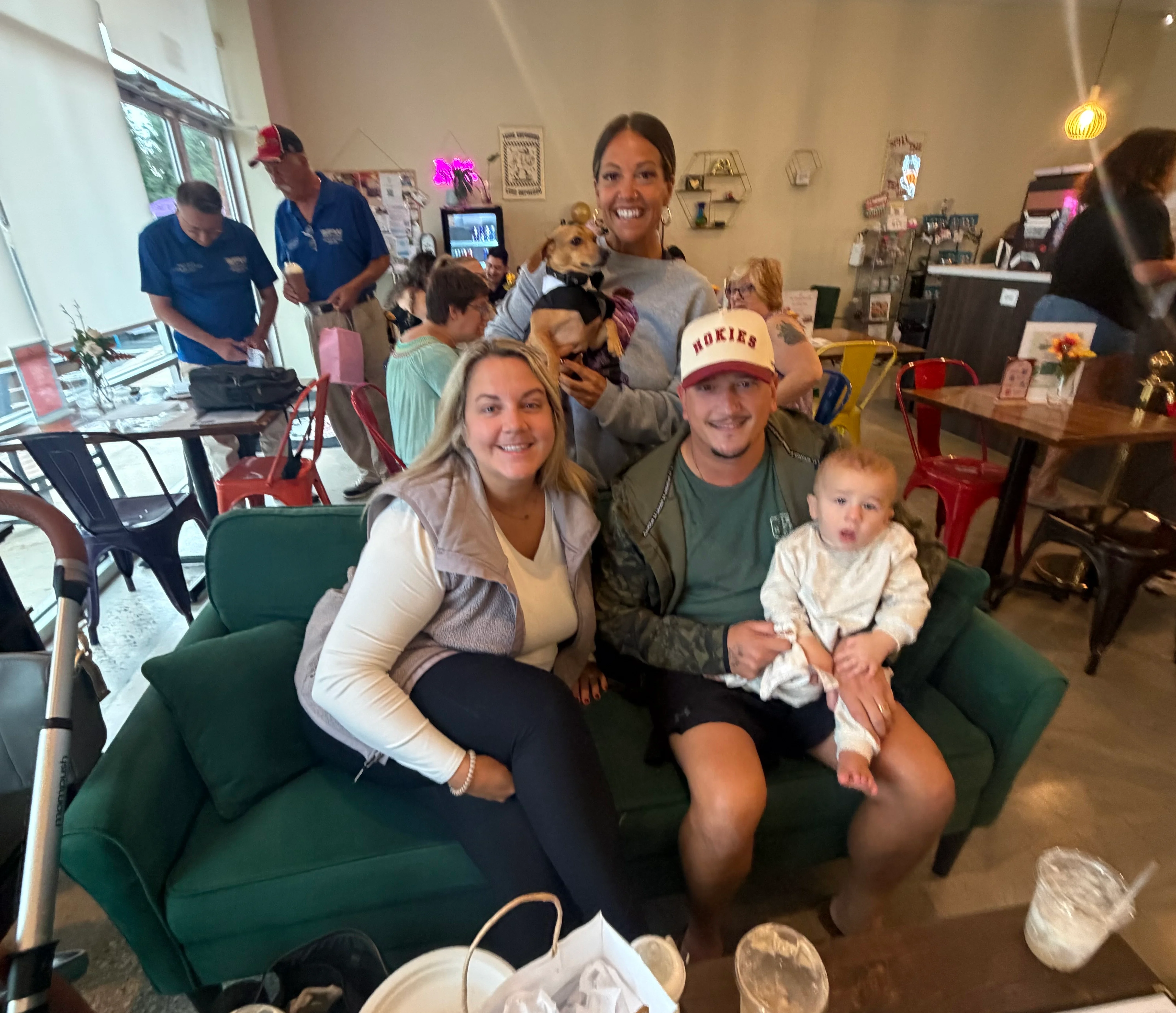 Group of friends enjoying time together in a cozy cafe setting