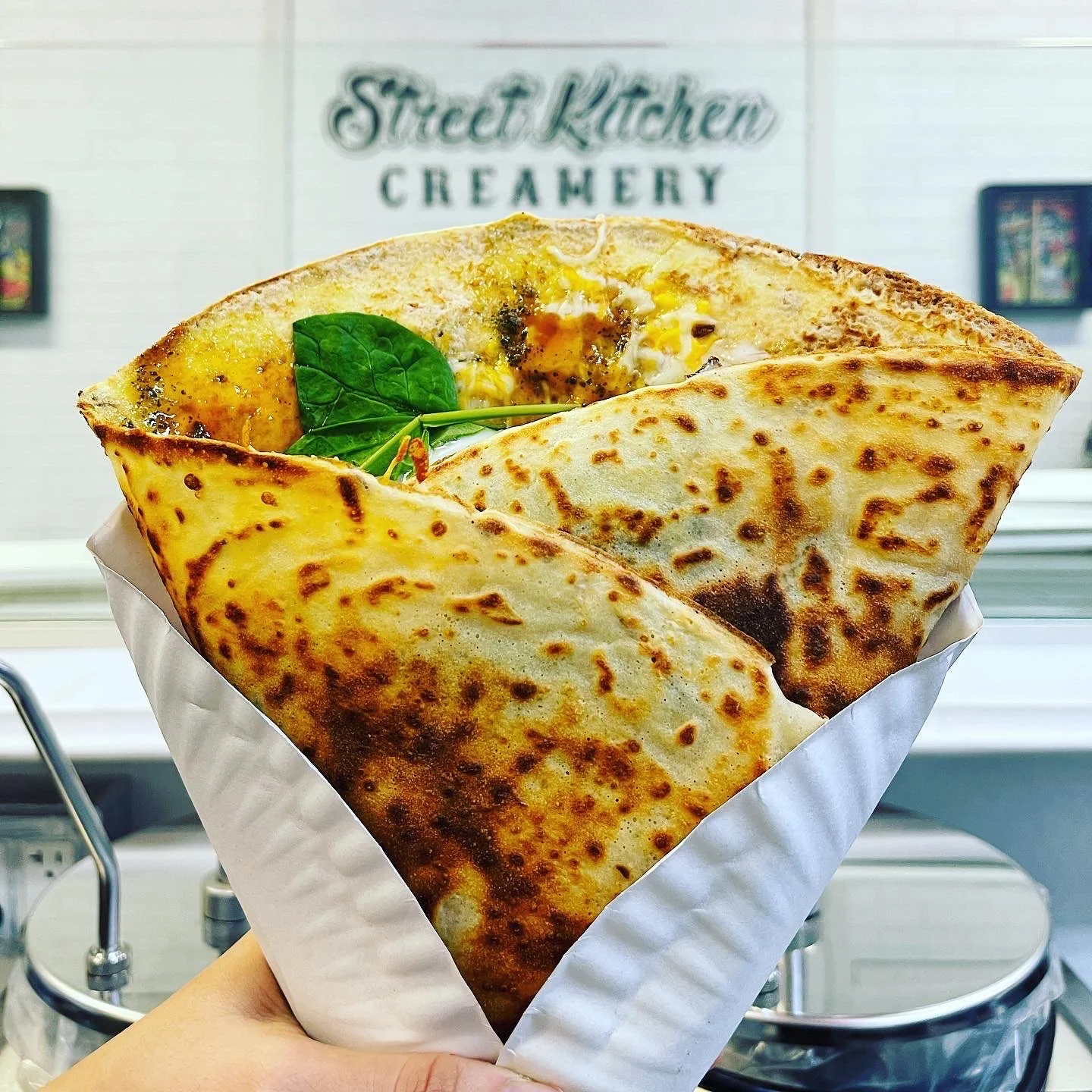 Savory Indian dosa filled with cheese and spinach