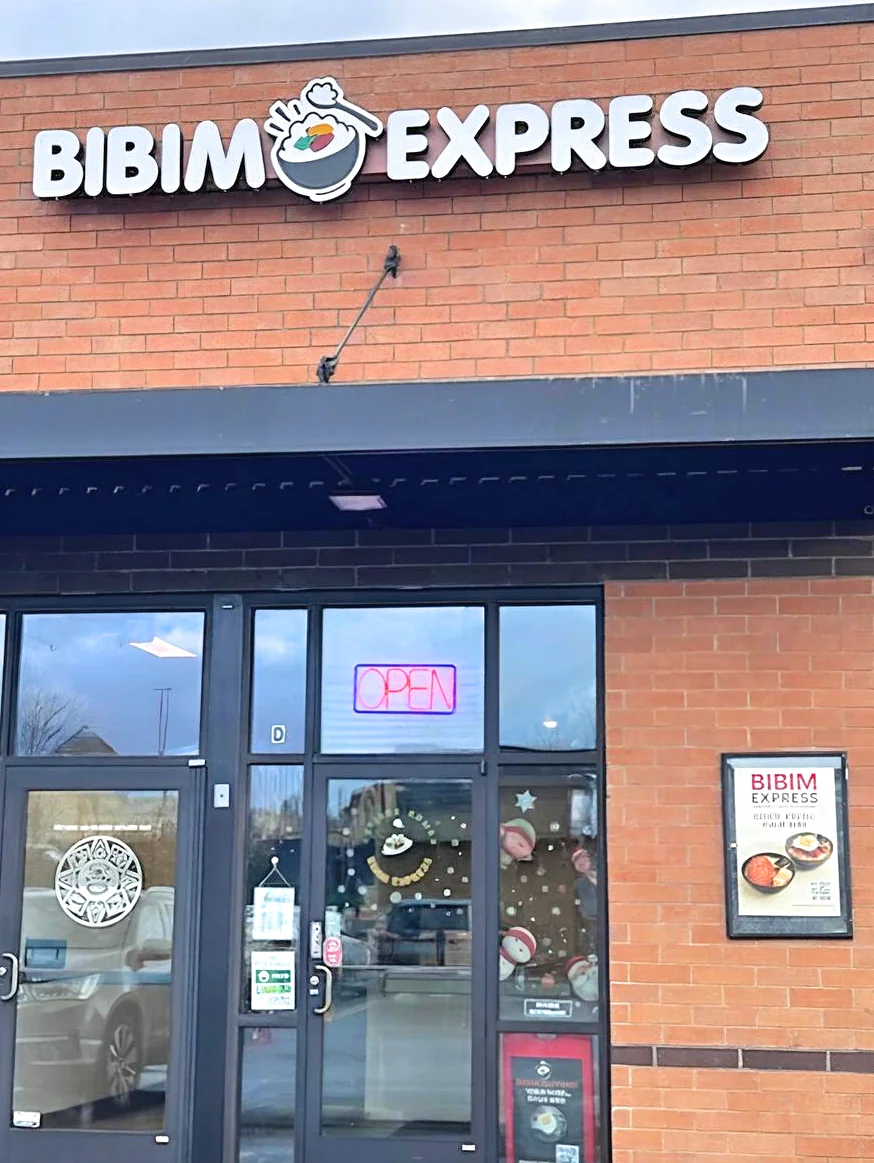 Exterior of Bibim Express restaurant with open sign
