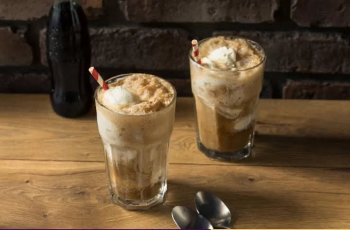 Classic root beer float served in tall glasses
