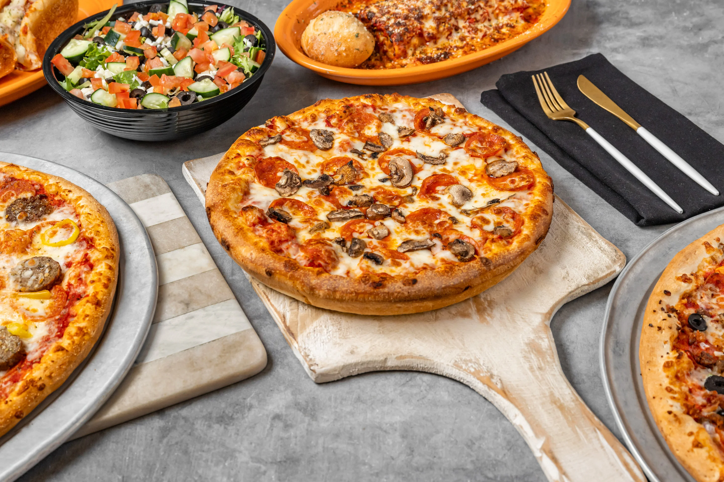 Delicious pepperoni pizza on a wooden serving board