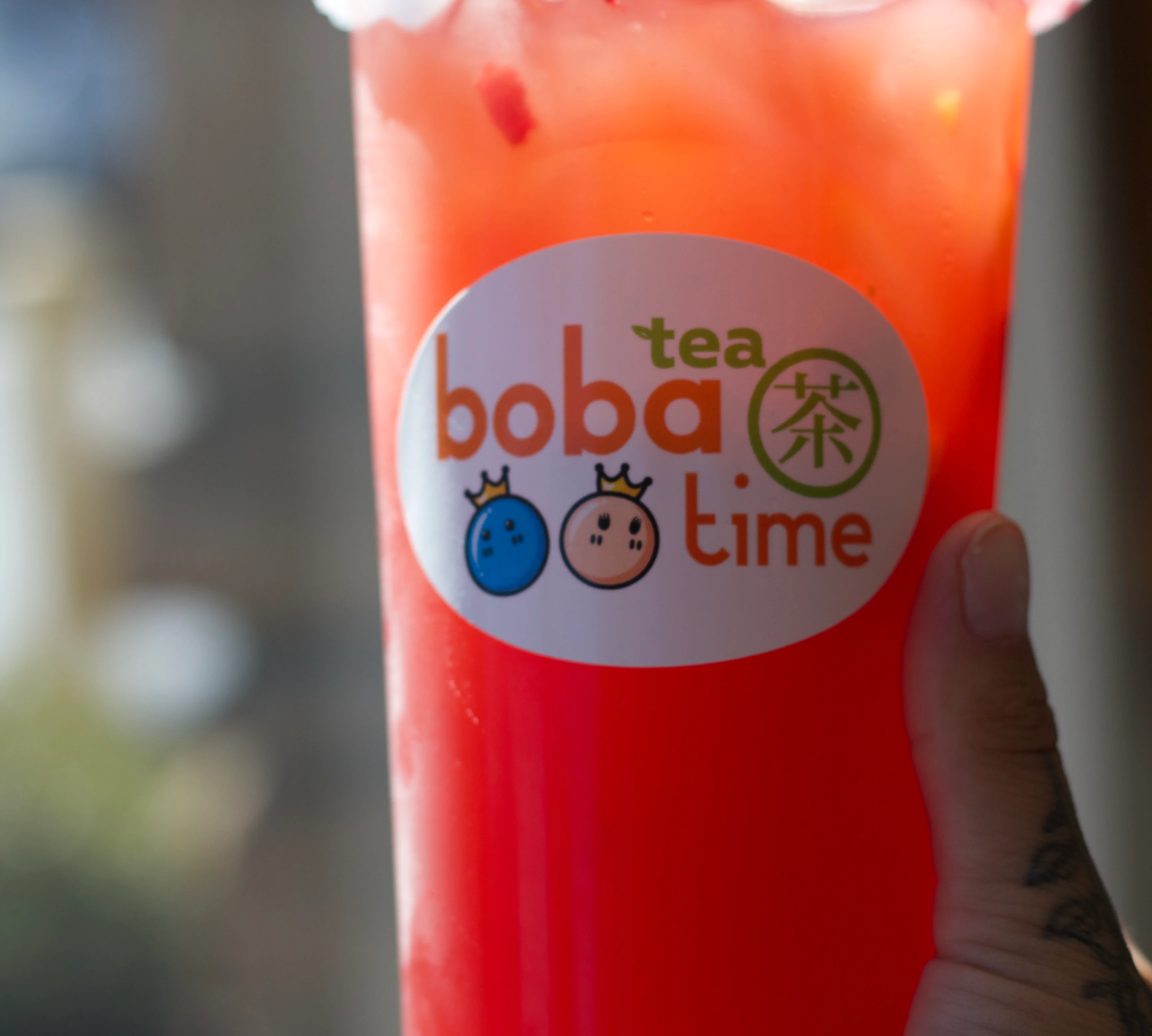 Colorful boba drinks in a cozy tea shop