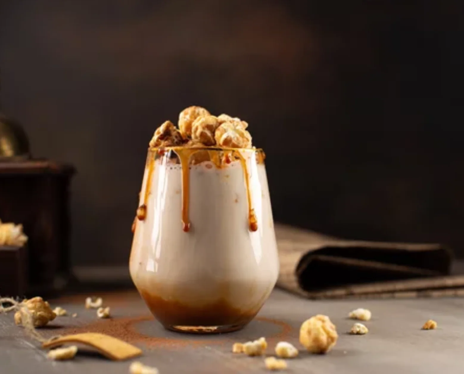 Delicious butterscotch pecan milkshake topped with whipped cream and pecans