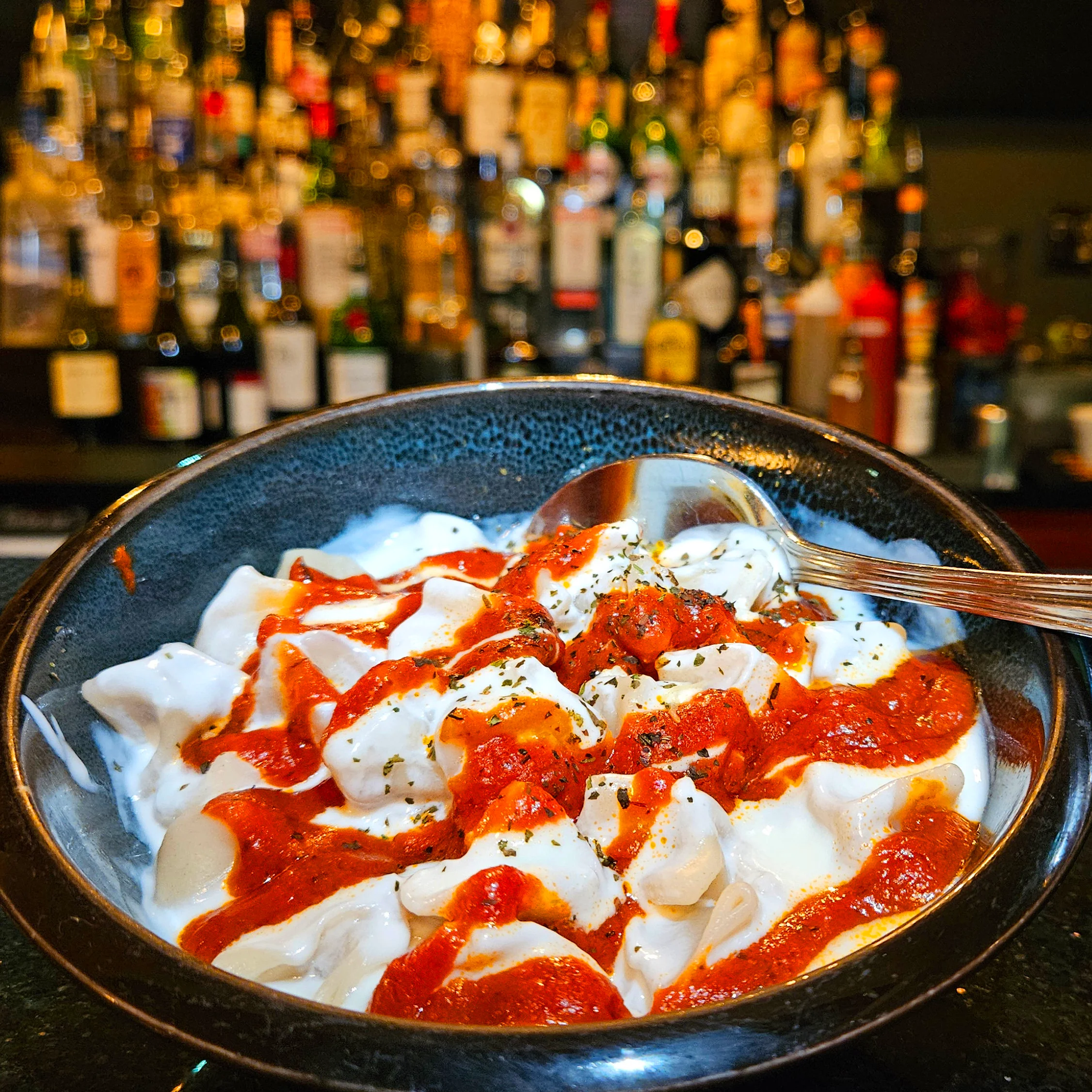 manti in front of the bar