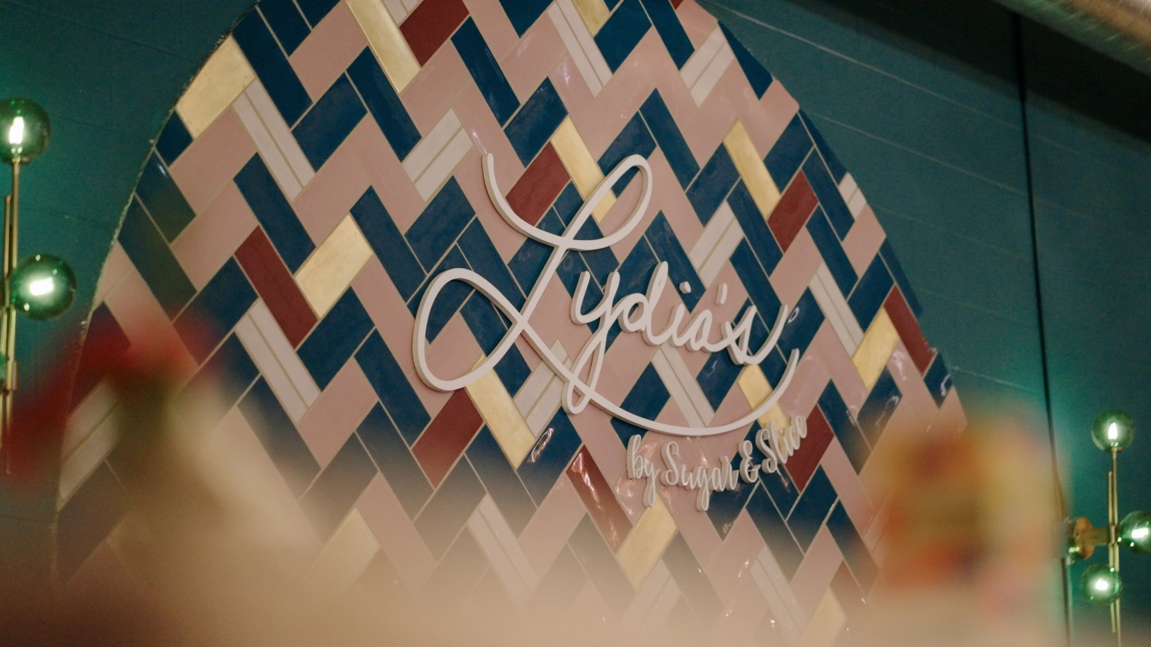Stylish restaurant interior with colorful tile wall