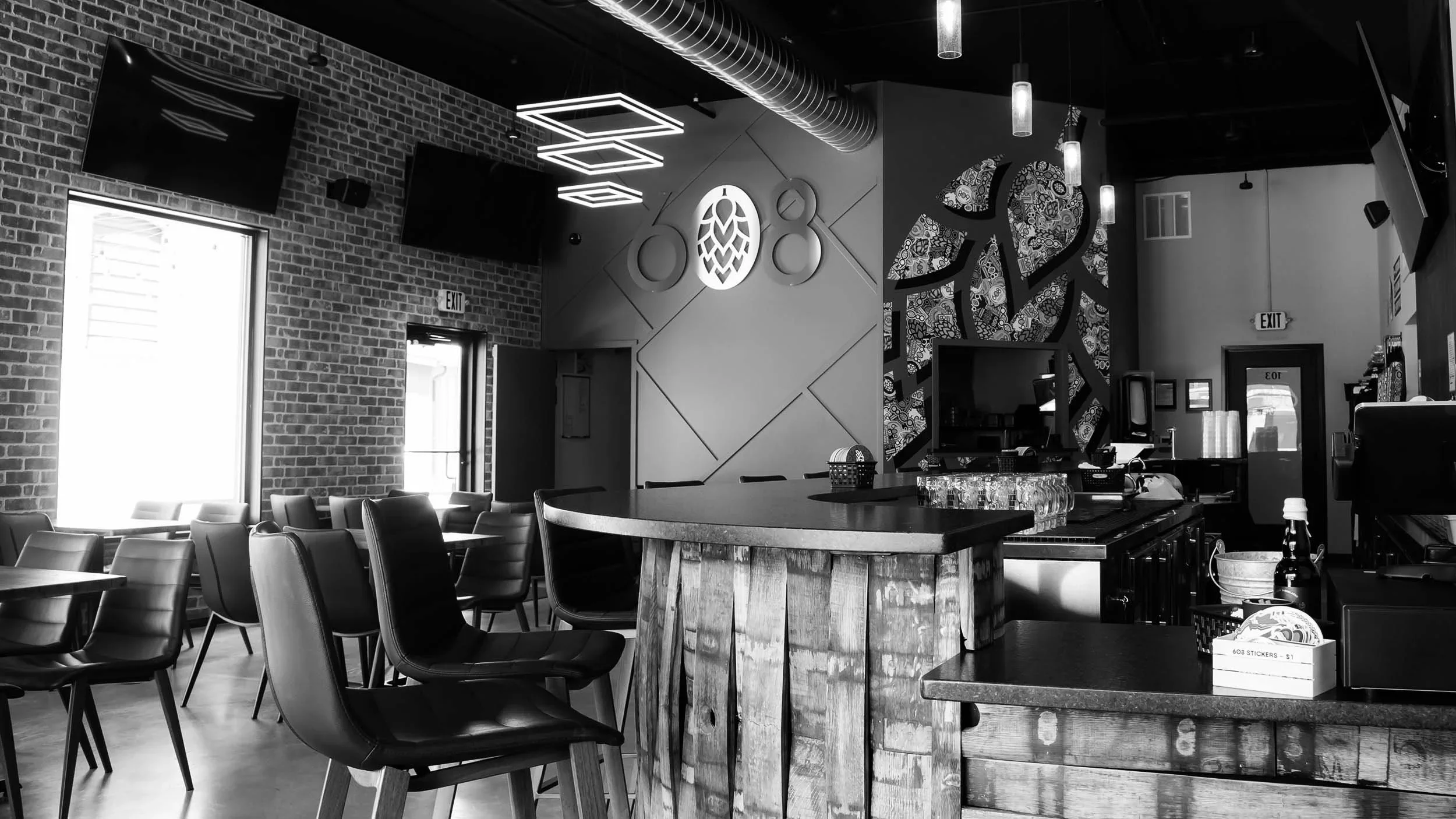 Modern restaurant interior with stylish decor and bar area