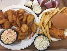 Crispy fried shrimp platter with sides