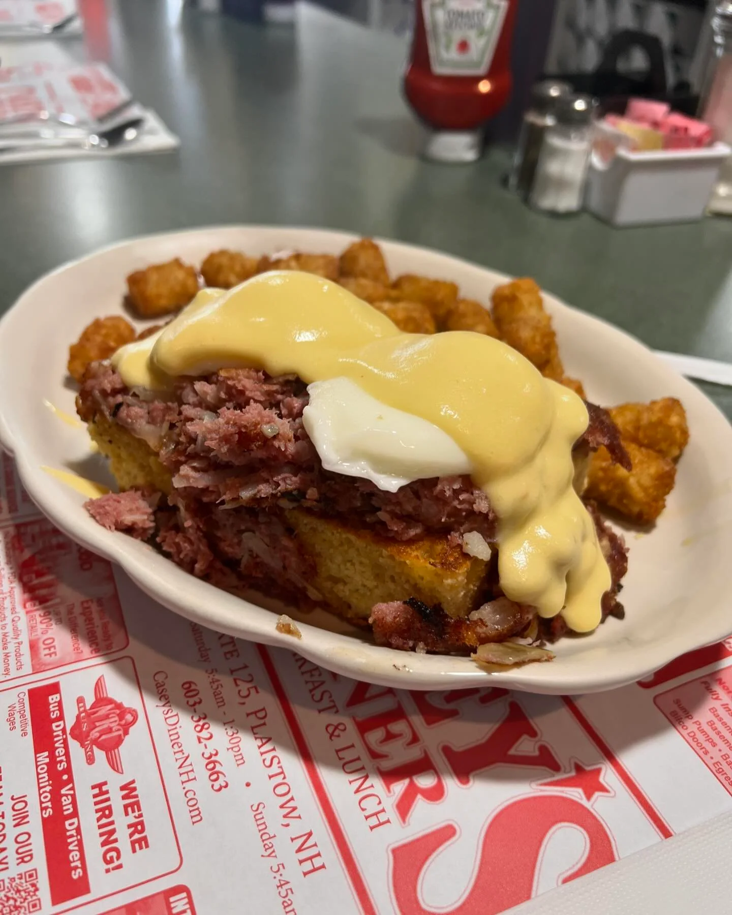 Corned beef hash benedict with poached eggs