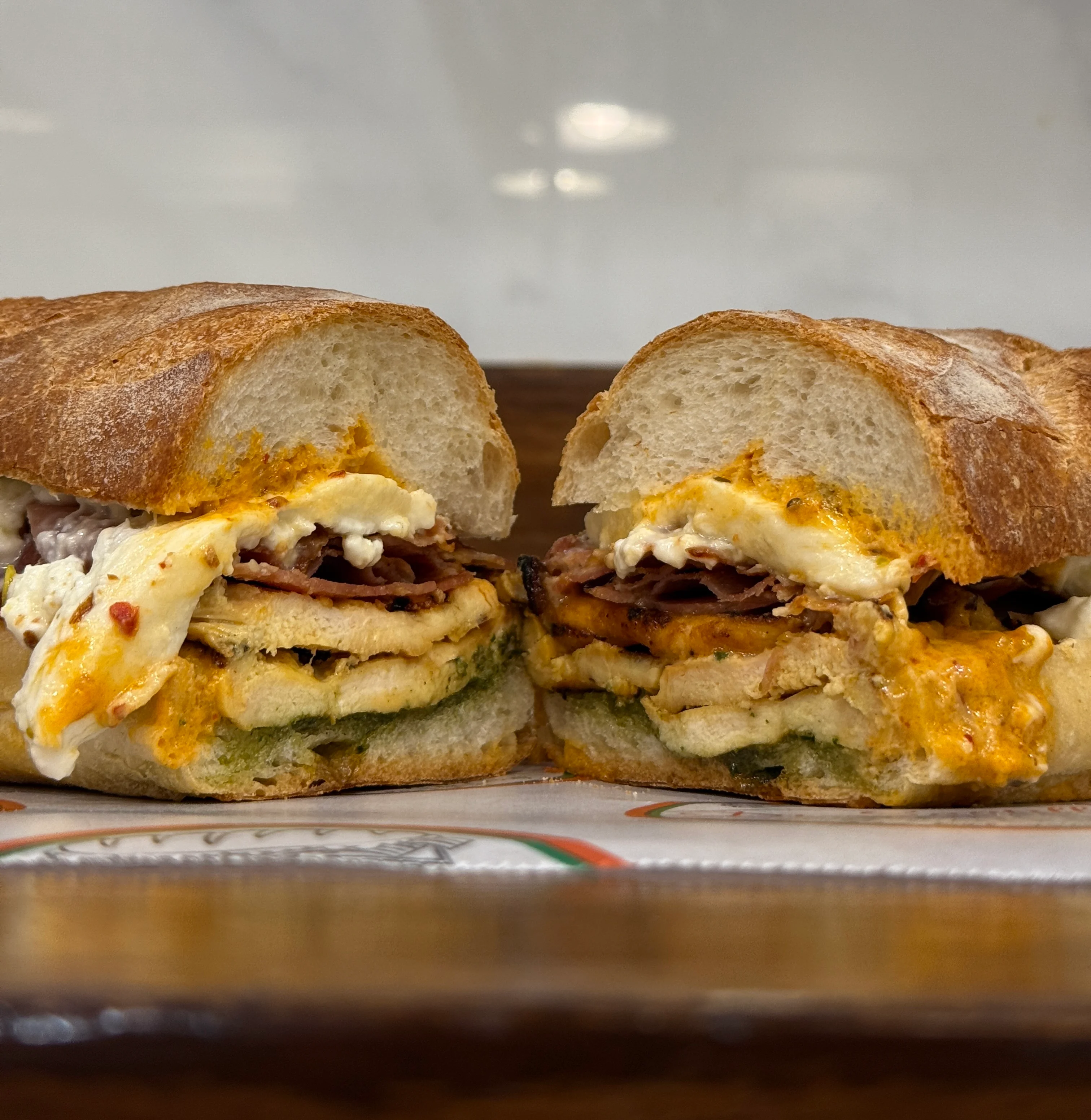 Loaded breakfast sandwich with eggs and meats