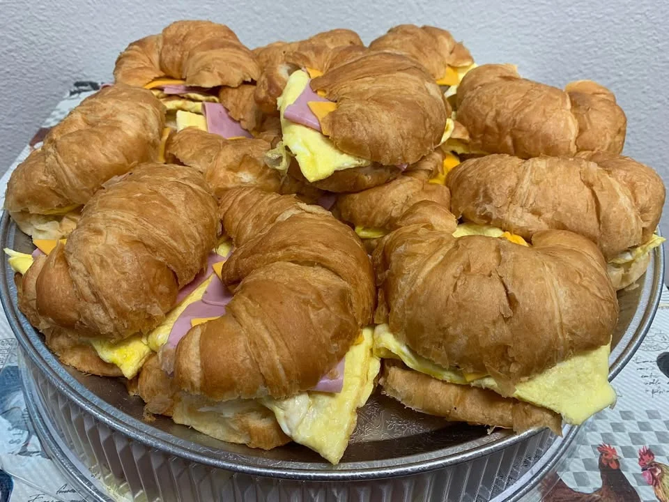 Croissant sandwiches with ham and cheese