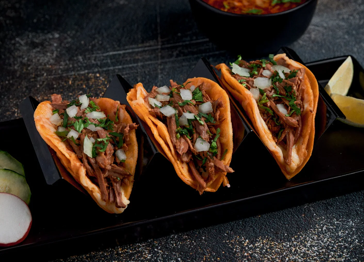 Authentic Mexican tacos with shredded beef and fresh toppings