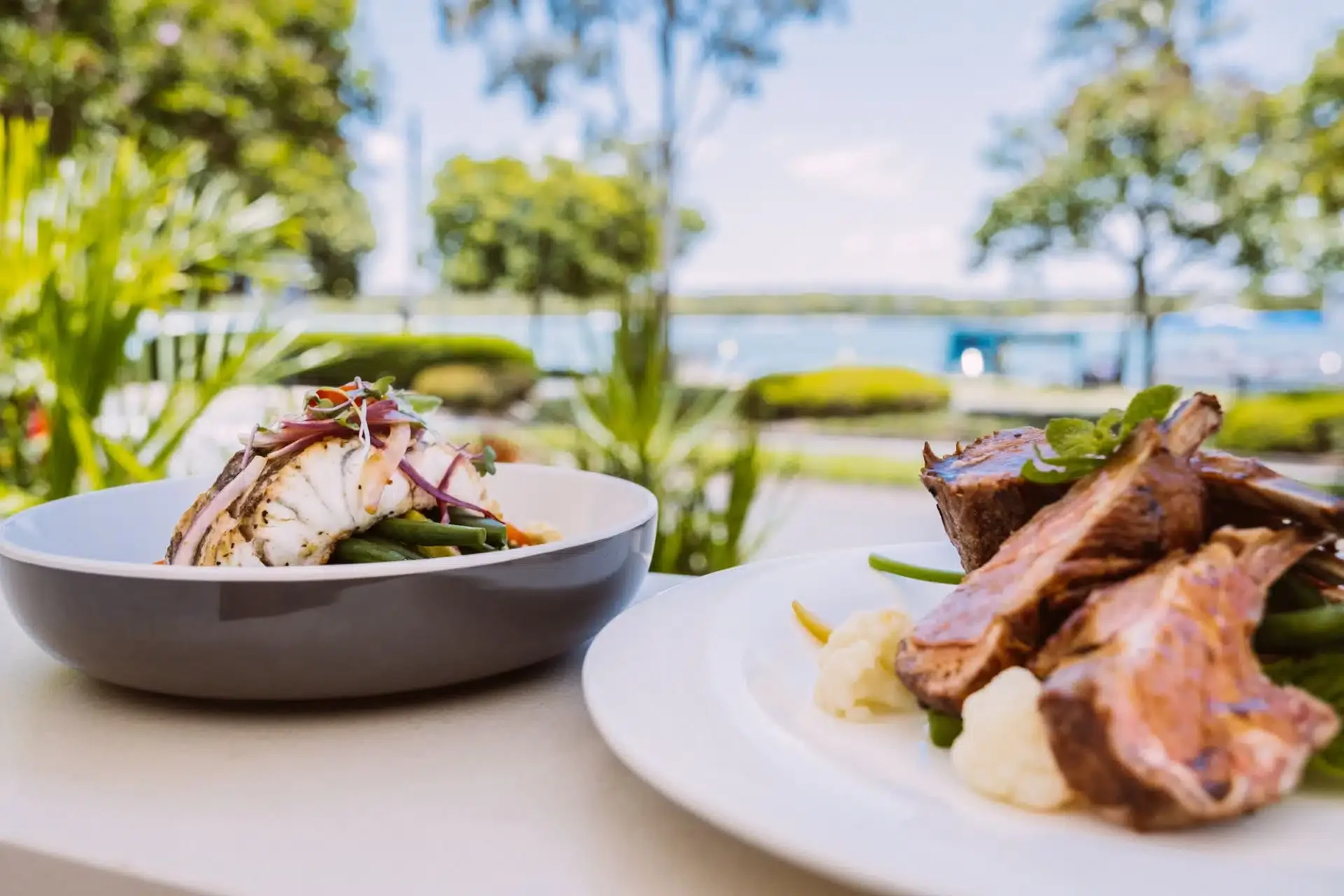 Grilled fish and lamb chops with vegetables