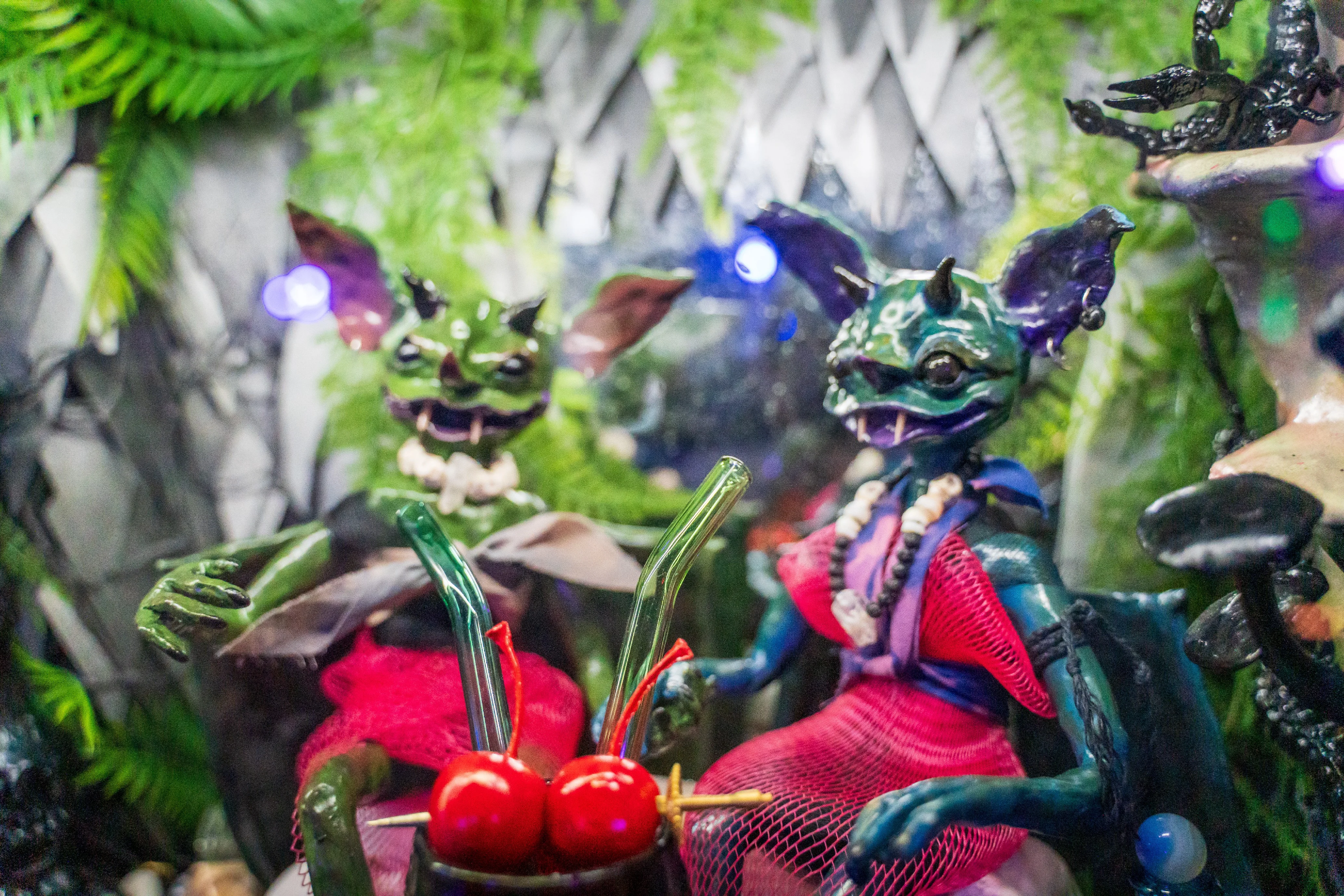Colorful fantasy figurines in a whimsical setting