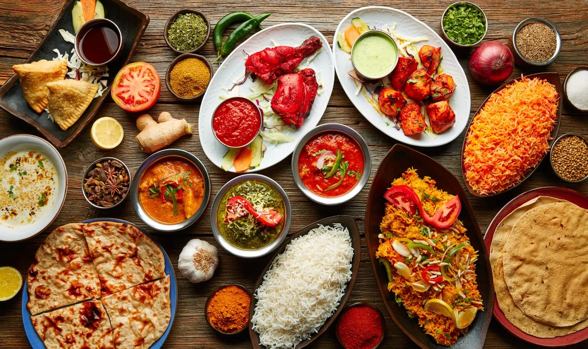 An array of delicious small bites and large sharing dishes featuring Middle Eastern delicacies and traditional colorful dishes