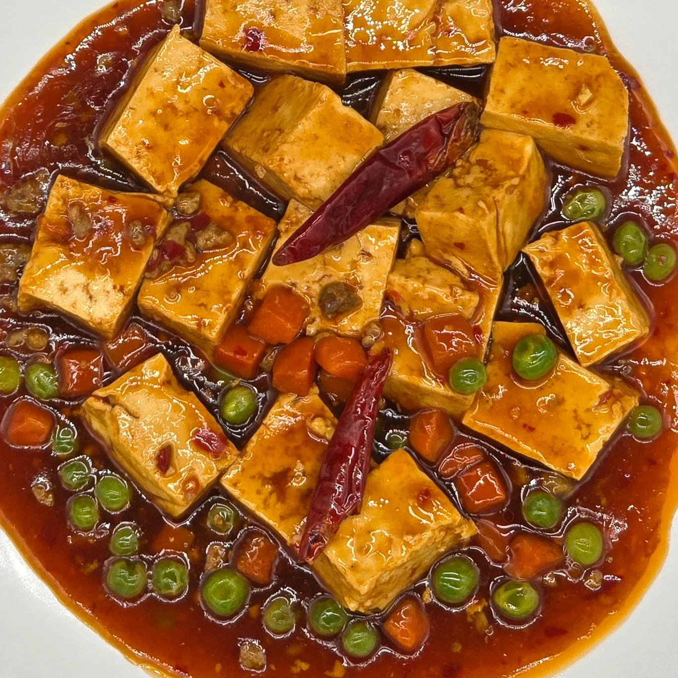 Spicy Sichuan mapo tofu with vibrant sauce