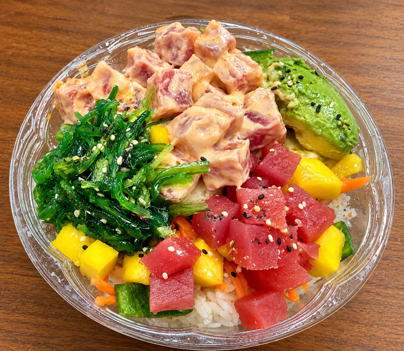 Colorful poke bowl with fresh fish and vegetables