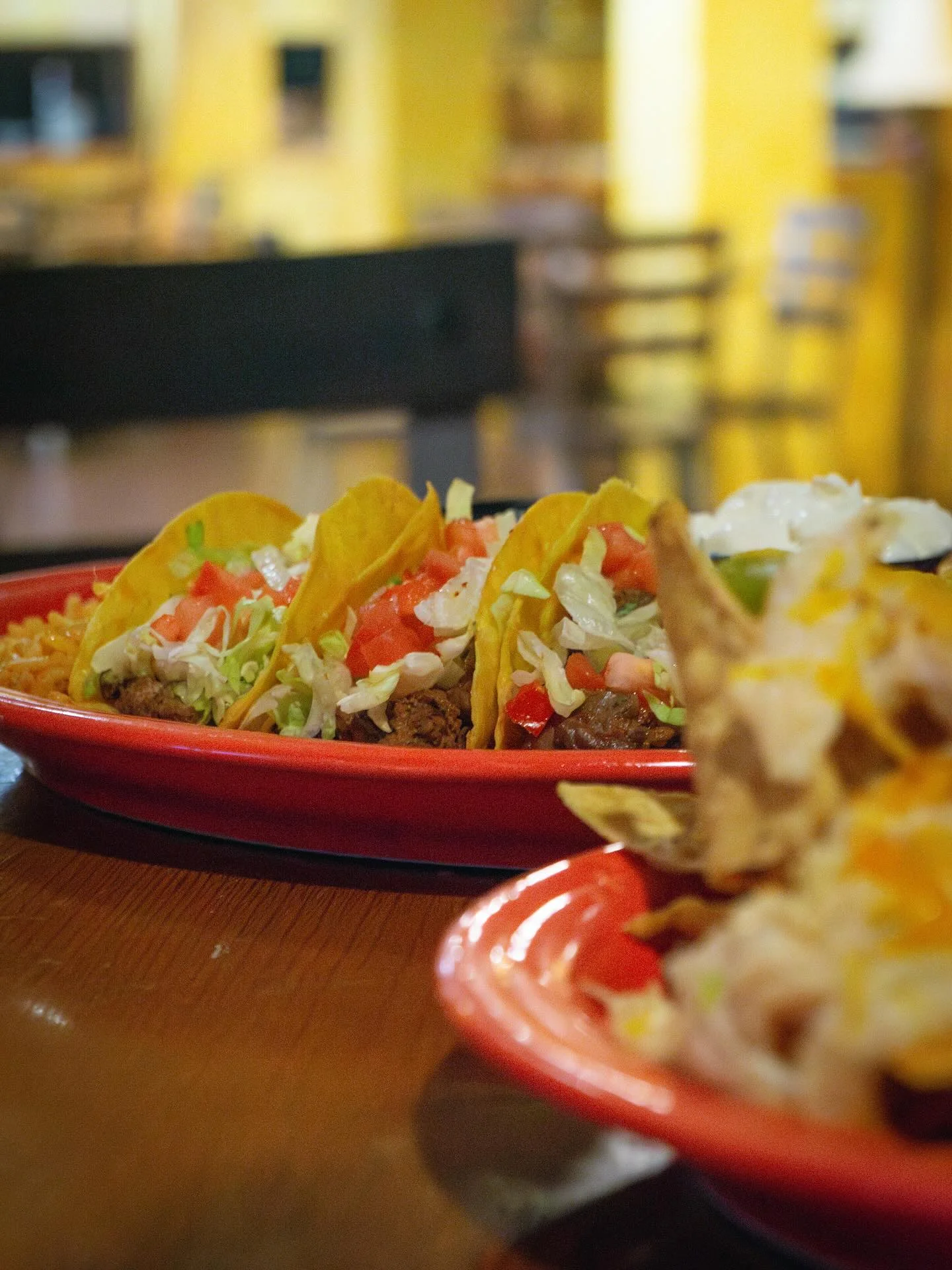 Plate of classic Mexican tacos with fresh toppings