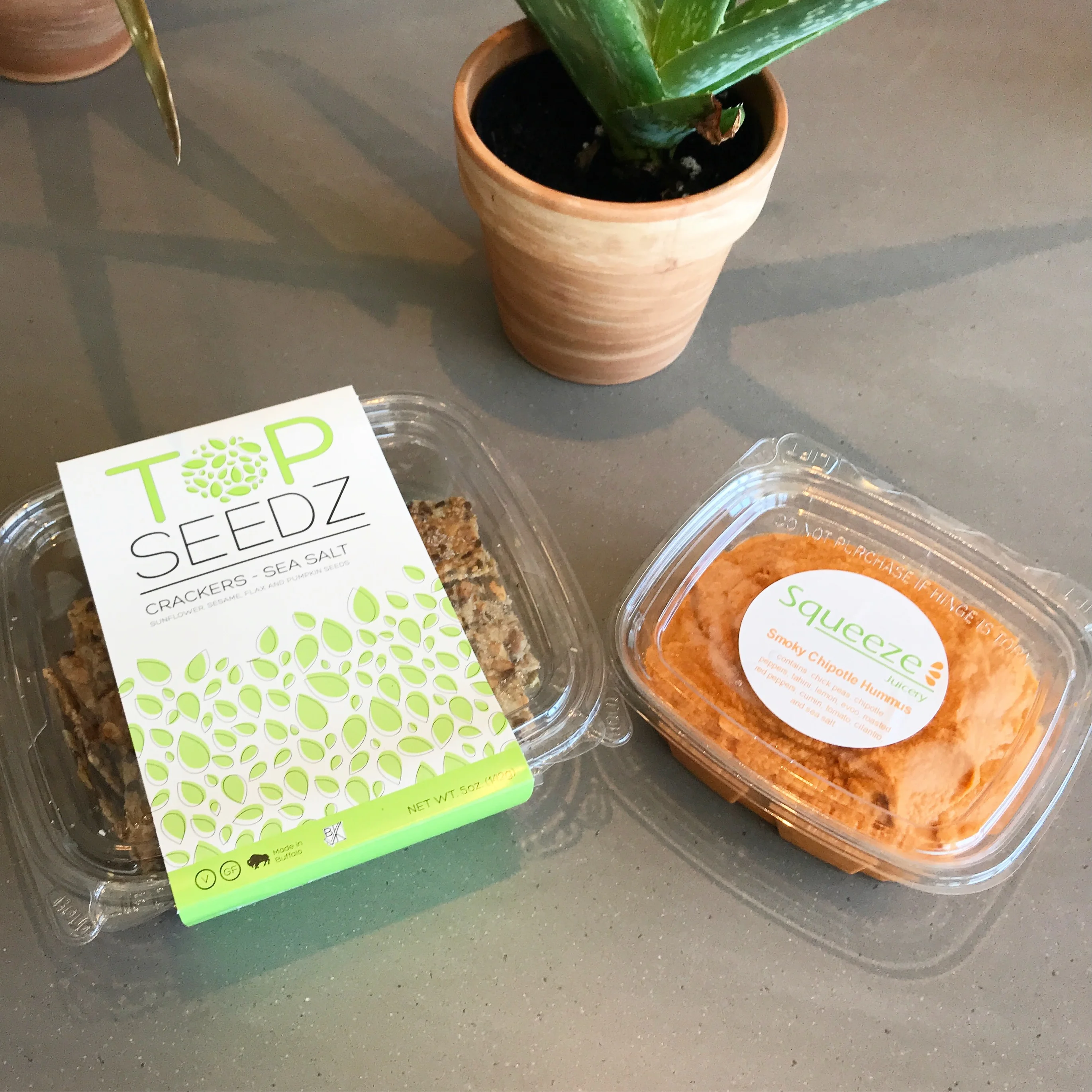 Sea salt crackers with smoky chipotle hummus